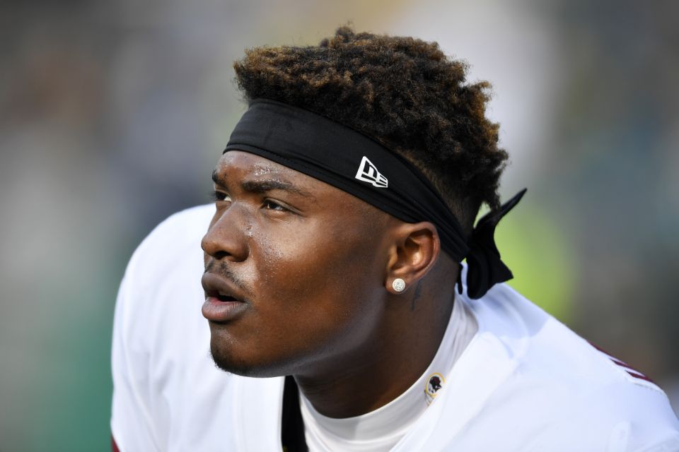 Dwayne Haskins # 7 of the Washington Redskins looks during a pre-match warm-up against the Green Bay Packers at Lambeau Field on December 8, 2019 in Green Bay, Wisconsin.  (Photo by Quinn Harris / Getty Images)