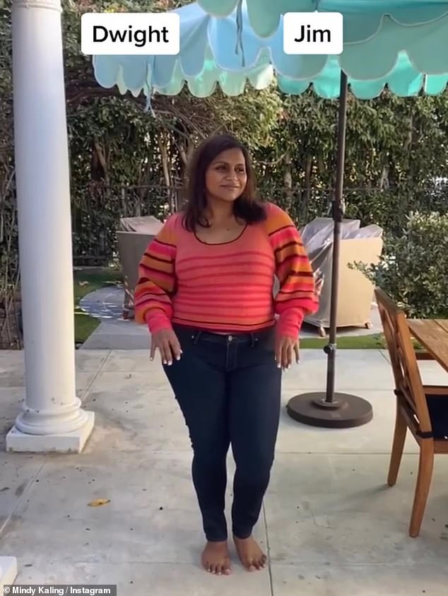 Vibrant: Mindy appears to be expecting some bright spring outfits with a coral jacket with red and orange horizontal stripes.